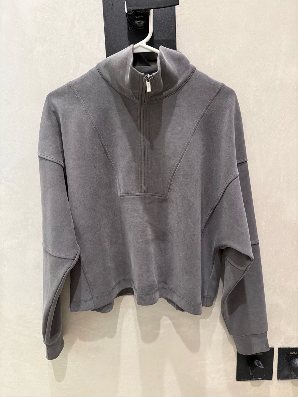 Sweaty Betty Quarter-Zip Cropped Pullover Sweatshirt and wide leg pants set.